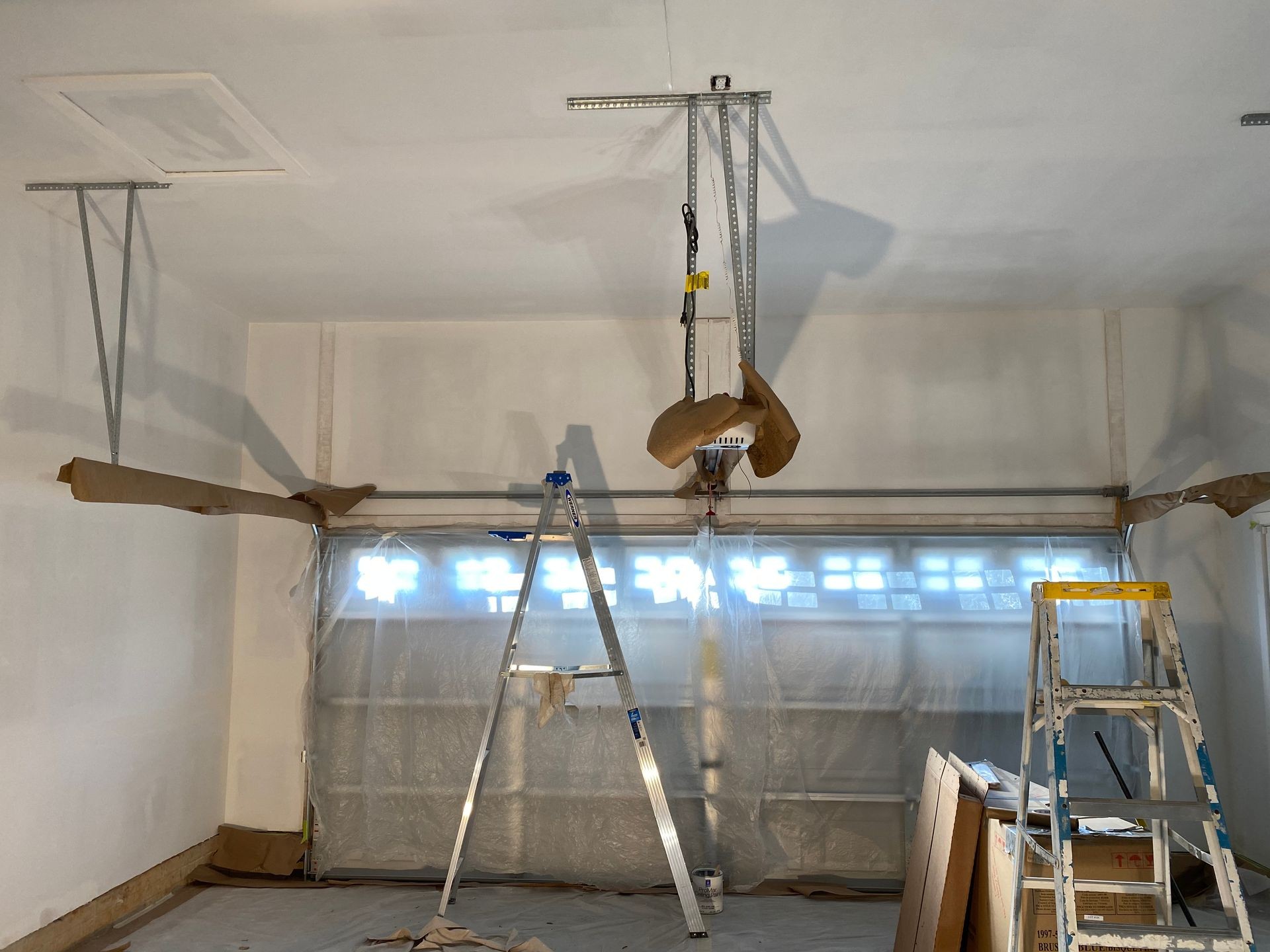 Garage Priming ceiling and walls. 